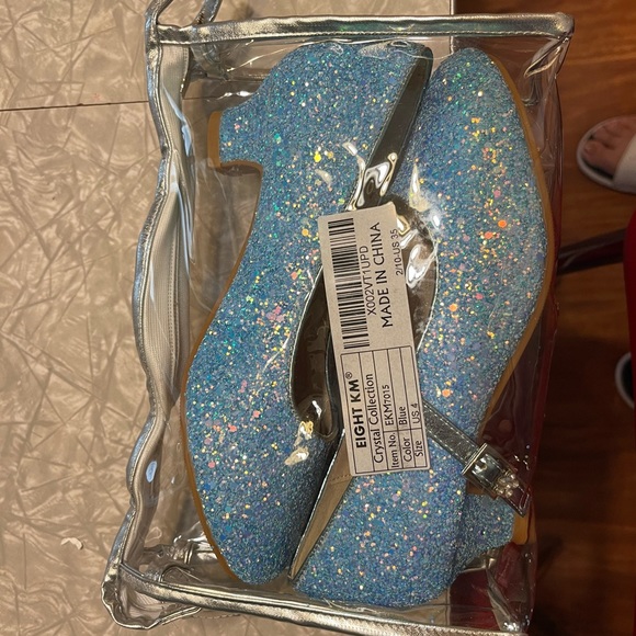 Blue sparkly Mary Jane’s with a 1’ heel and a flower on the clasp - Picture 2 of 6